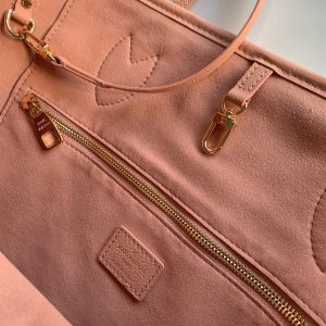 Neverfull MM tote bag Monogram Empreinte leather Pink