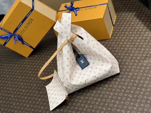 LV Atlantis GM Material Monogram Dune Canvas